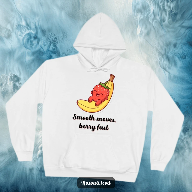 Funny hoodie showing a smiling strawberry character gleefully sliding down a banana peel, soft and full of charm.