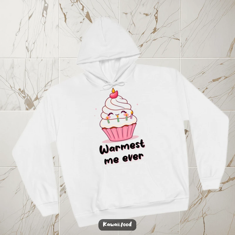 Funny Hoodie illustration of a happy cupcake character exhaling small birthday candles, exuding warmth and a festive, joyful spirit.